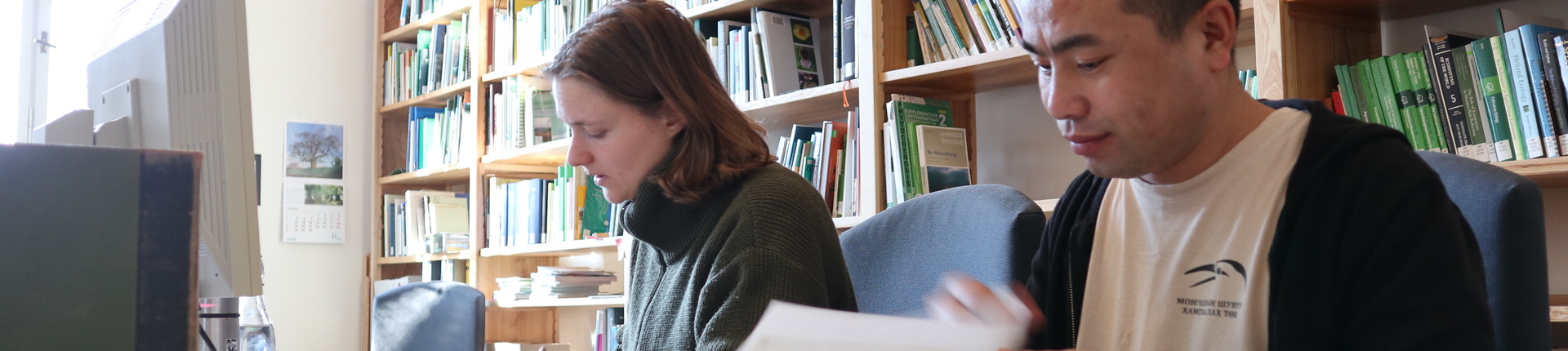 Scholarship holders in the in-house library. Photo: Michael Succow Foundation